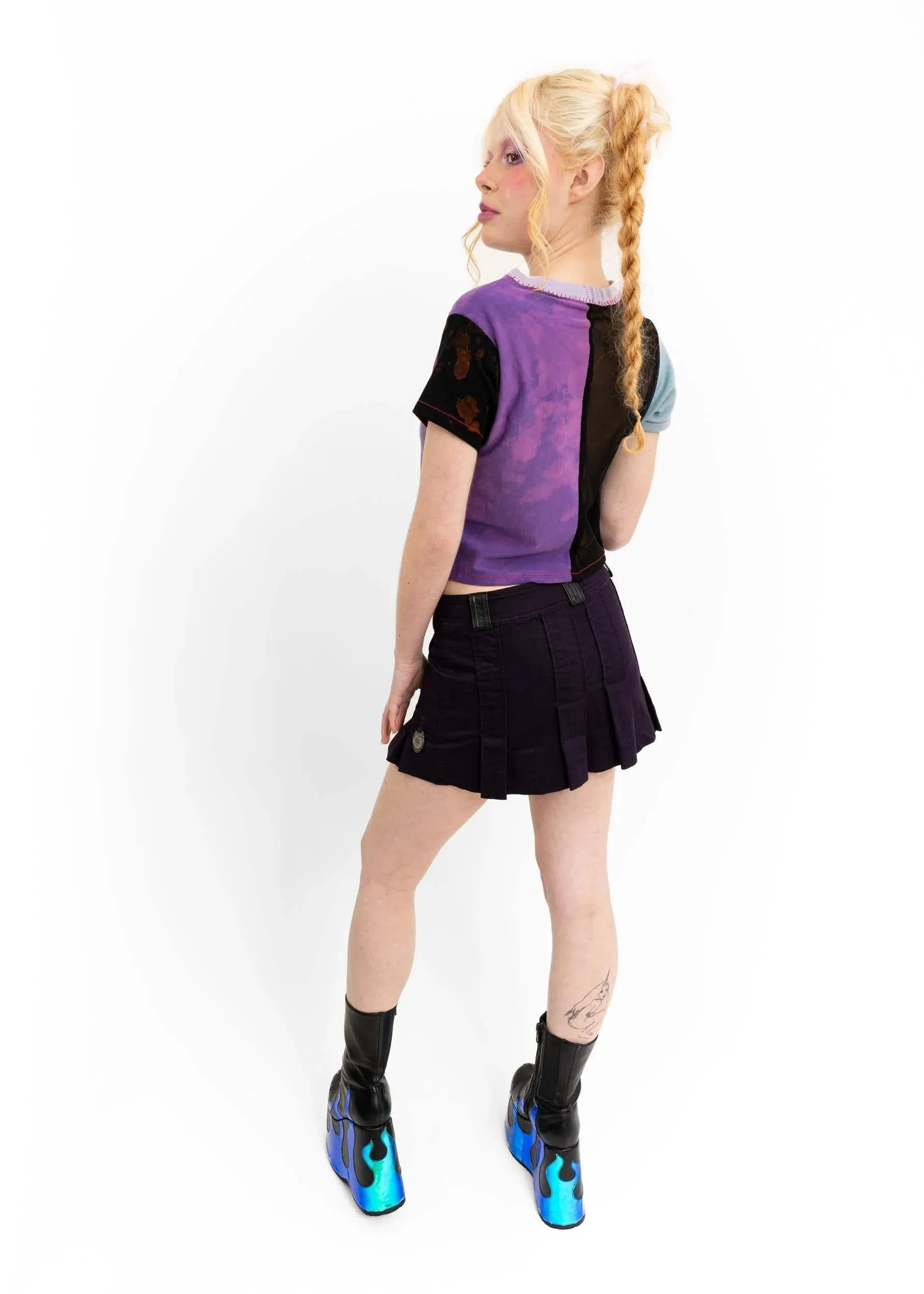 Pleated mini skirt with leather accents