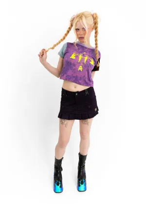 Pleated mini skirt with leather accents
